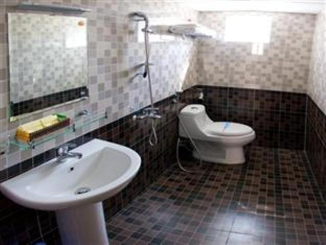 Готель Hoa Bao Вунгтау Номер фото